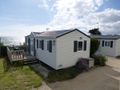 MOBILHOME 6 personnes - Panoramique Grand Confort, vue sur mer (grande vue intérieur et extérieur)