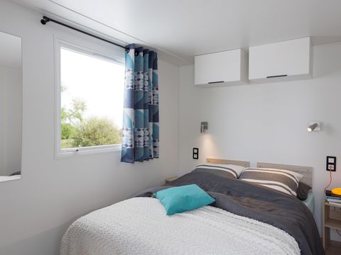 Mobilhome 5 personnes - COSY 2 chambres (TV - terrasse 12m² - superficie 28m²)