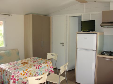 Mobilhome 5 personnes - COSY 2 chambres (TV - terrasse 12m² - superficie 28m²)