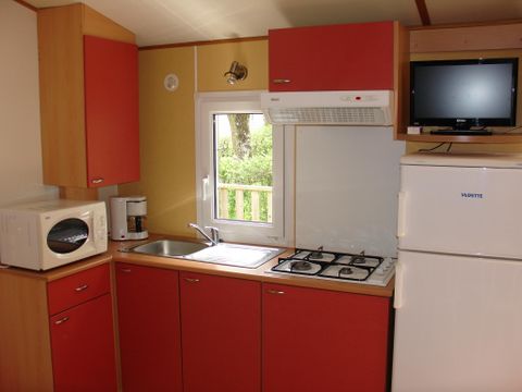 Mobilhome 5 personnes - COSY-CLIM 2 chambres (climatisation - TV - terrasse 12m² - superficie 28m²)