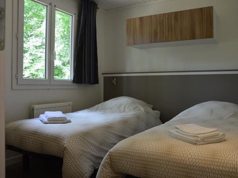 CHALET 4 personnes - Vacances 2Ch 4/6p (2 personnes supplémentaires possible en supplément contacter le camping)