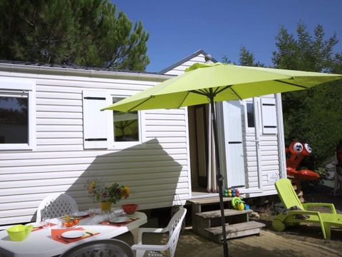 MOBILHOME 4 personnes - Mobil-home 24m² / 2 chambres - Terrasse au sol - 2 ADULTES OU 2 ADULTES +2 ENFANTS