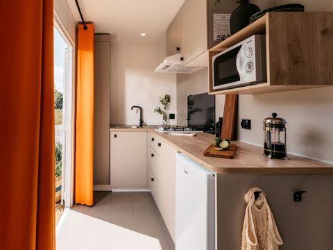 Mobilhome 2 personnes - Mobil home Confort - 1 chambre - terrasse semi-couverte