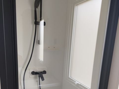 Mobilhome 2 personnes - Mobil home Confort - 1 chambre - terrasse semi-couverte