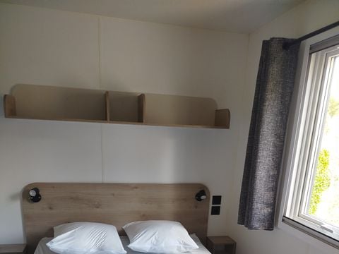Mobilhome 2 personnes - Mobil home Confort - 1 chambre - terrasse semi-couverte
