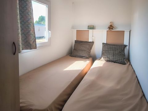 Mobilhome 4 personnes - 4 couchages avec grande terrasse - Avec clim