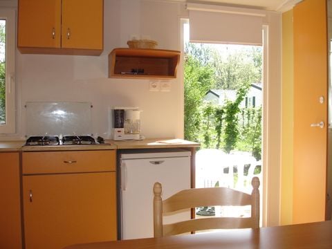 MOBILHOME 8 personnes - Mobil home Confort 31m² / 3 chambres + TV + Terrasse non couverte 6/8 pers