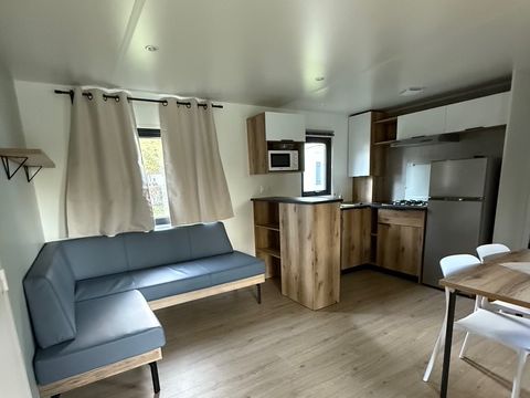 Mobilhome 2/4 personnes - Confort 27m² / - 2 chambres - TV - Terrasse couverte - Bord de rivière - 2/4 pers