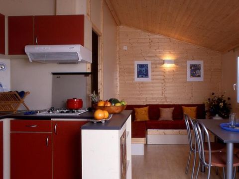 Chalet 6 personnes - Confort 27m² 2 chambres + terrasse couverte 10m² - TV* 4/6 pers