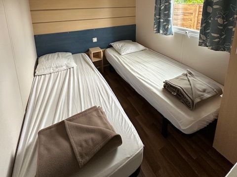 Mobilhome 6 personnes - Confort 28m² 2 chambres + terrasse couverte 13.5m² -4/6 pers
