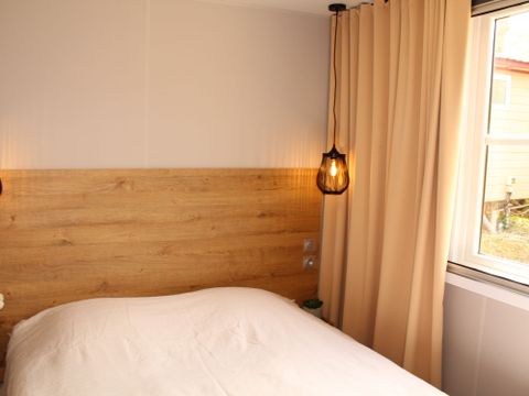 Mobilhome 4 personnes - Mobil-home Premium 30m² 2 chambres + terrasse 25m² - TV - Clim - Spa 1/4 pers