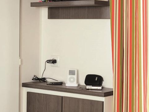 MOBILHOME 4 personnes - Cottage Louisiane - 2 chambres : 31m² - Terrasse semi-couverte 15m² 4 pers.