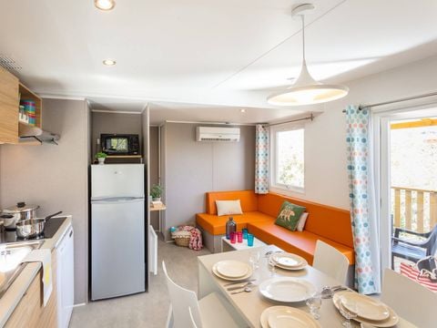 BUNGALOW 6 personnes - Mobil-home | Premium | 3 Ch. | 6 Pers. | Terrasse surélevée | Clim. | TV BUNGALOW 6 personnes - Mobil-home | Premium | 3 Ch. | 6 Pers. | Terrasse surélevée | Clim. | TV