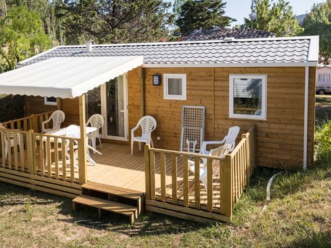 BUNGALOW 4 personnes - Mobil-home | Premium | 2 Ch. | 4 Pers. | Terrasse surélevée | Clim. | TV BUNGALOW 4 personnes - Mobil-home | Premium | 2 Ch. | 4 Pers. | Terrasse surélevée | Clim. | TV