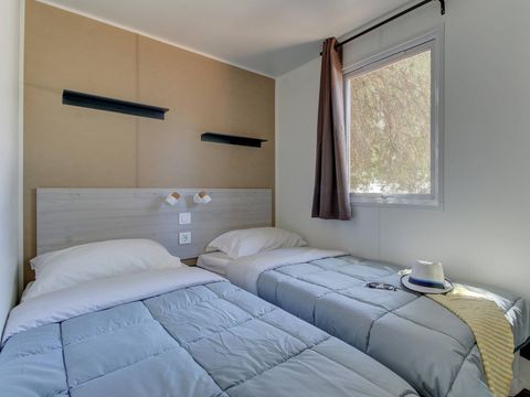 MOBILHOME 4 personnes - Mobil-home | Comfort | 2 Ch. | 4 Pers. | Terrasse surélevée | Clim. MOBILHOME 4 personnes - Mobil-home | Comfort | 2 Ch. | 4 Pers. | Terrasse surélevée | Clim.