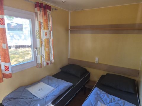 MOBILHOME 4 personnes - Mobil-home Eco Nature – 2 chambres – sanitaires communs