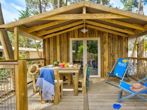 LODGE 4 personnes - Sweetflower 2ch -SPA-TV-plancha-terrasse couverte- 32m² | PREMIUM