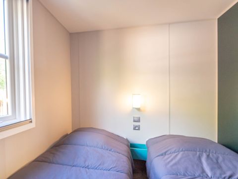 Mobilhome 4 personnes - Garden - 2 chambres-CLIM-baignoire-TV-lave-vaisselle-plancha-terrasse - Couverte-31m² - PREMIUM
