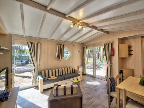 Chalet 4 personnes - Cottage Confort Clim - 2 chambres - CONFORT CLIM - 32 à 43m² - Clim - TV - Lave-vaisselle. - Plancha