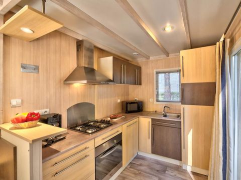 Chalet 4 personnes - Cottage Confort Clim - 2 chambres - CONFORT CLIM - 32 à 43m² - Clim - TV - Lave-vaisselle. - Plancha