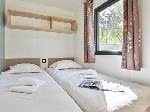 CHALET 4 personnes - Chalet | Comfort | 2 Ch. | 4 Pers. | Terrasse simple | 1 SDB | Clim.