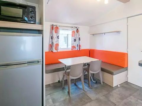Mobilhome 4 personnes - Classic | 2 Ch. | 4 Pers. | Terrasse surélevée | Clim. par Homair