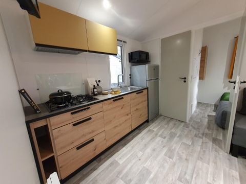 Mobilhome 4 personnes - 2021 - 25m2 Climatisation - Terrasse bois couverte 8m2.