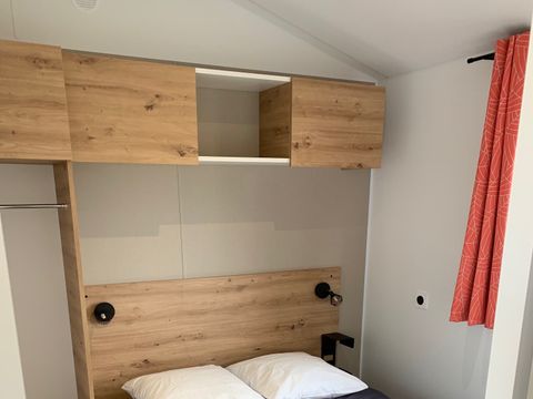 Mobilhome 4 personnes - 2021 - 25m2 Climatisation - Terrasse bois couverte 8m2.