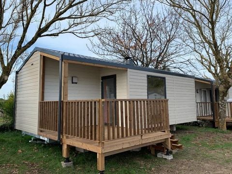 Mobilhome 4 personnes - 2021 - 25m2 Climatisation - Terrasse bois couverte 8m2.