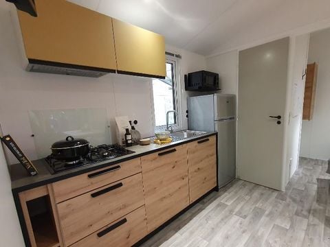 Mobilhome 4 personnes - 2021 - 25m2 Climatisation - Terrasse bois couverte 8m2.