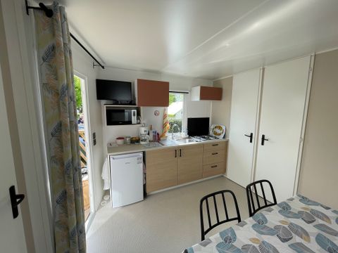 Mobilhome 4 personnes - 2021 - 25m2 Climatisation - Terrasse bois couverte 8m2.
