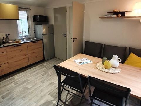 Mobilhome 4 personnes - 2021 - 25m2 Climatisation - Terrasse bois couverte 8m2.