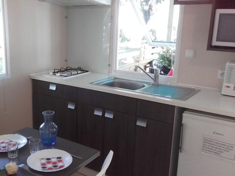 Mobilhome 2/4 personnes - 20m² - Terrasse bois couverte 8m².