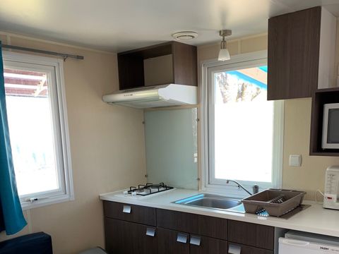 Mobilhome 2/4 personnes - 20m² - Terrasse bois couverte 8m².