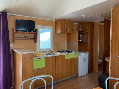 Mobilhome 4/6 personnes - 30m² - Terrasse bois semi-couverte 12m²