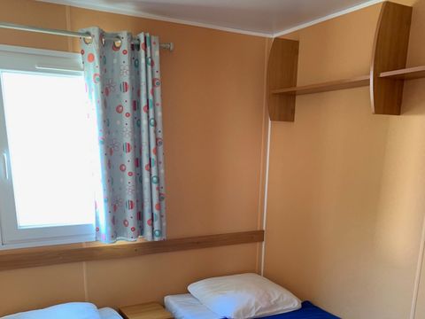Mobilhome 4/6 personnes - 30m² - Terrasse bois semi-couverte 12m²
