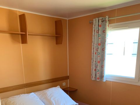 Mobilhome 4/6 personnes - 30m² - Terrasse bois semi-couverte 12m²