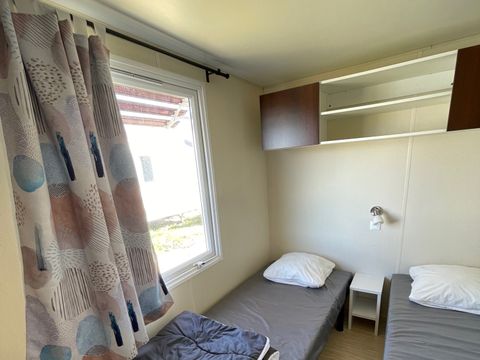 Mobilhome 4 personnes - 26m² - Terrasse bois intégrée de 7m².