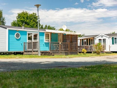 MOBILHOME 6 personnes - Mobil-home | Comfort | 3 Ch. | 6 Pers. | Terrasse couverte | 1 SDB | Clim. | TV