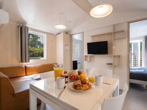 MOBILHOME 4 personnes - Mobil-home | Ultimate | 2 Ch. | 4 Pers. | Terrasse couverte | 1 SDB | Clim. | TV