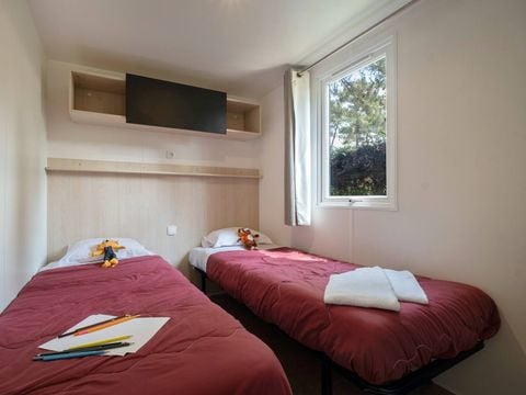 MOBILHOME 4 personnes - Mobil-home | Ultimate | 2 Ch. | 4 Pers. | Terrasse couverte | 1 SDB | Clim. | TV