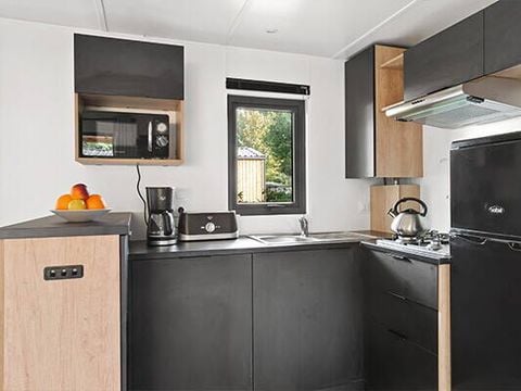 MOBILHOME 4 personnes - Ultimate | 2 Ch. | 4 Pers. | Terrasse couverte | Jacuzzi | Douche extérieure | 1 SDB | Clim. | TV