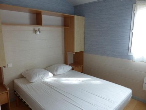 Chalet 2/6 personnes - Confort -35m² -2 chambres - Terrasse semi-couverte - TV - Clim