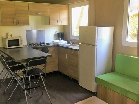 CHALET 7 personnes - Chalet VEGA 32m² (2 chambres), canapé lit dans le salon