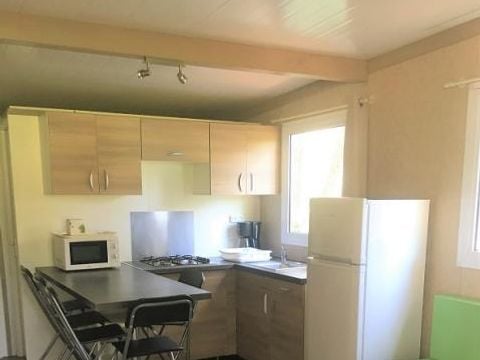 CHALET 7 personnes - Chalet VEGA 32m² (2 chambres), canapé lit dans le salon