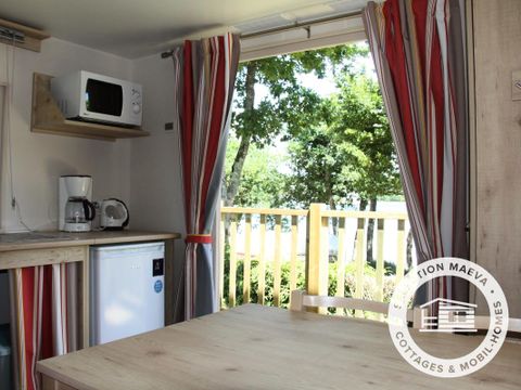 Hébergement 4 personnes - Roulotte 3 Pièces 4 Personnes + TV