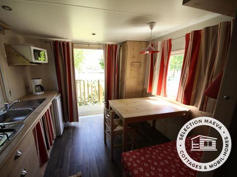 Hébergement 4 personnes - Roulotte 3 Pièces 4 Personnes + TV
