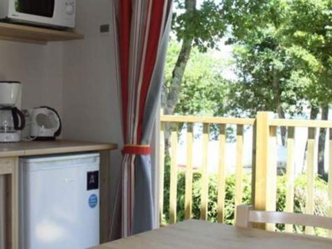 Hébergement 4 personnes - Roulotte 3 Pièces 4 Personnes + TV