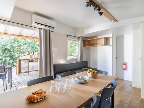 MOBILHOME 6 personnes - Mobil-home | Premium | 3 Ch. | 6 Pers. | Terrasse couverte | 1 SDB | Clim. | TV