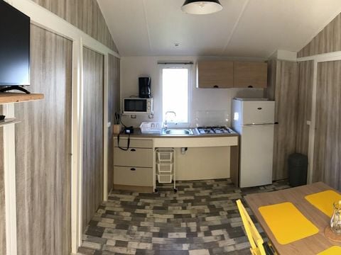 MOBILHOME 4 personnes - PMR 31m² - 2 chambres - terrasse couverte (adapté pour personnes à mobilité réduite) - TV
